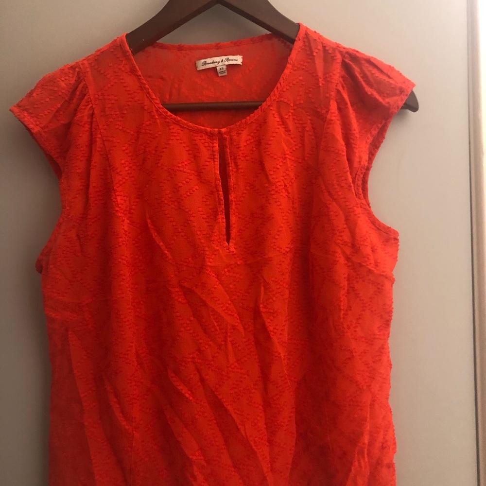 Orange Short Sleeved Blouse.